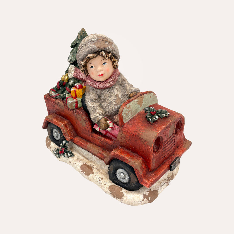 Bimbo con Macchina in Resina – Figurina Natalizia decorativa