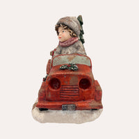 Bimbo con Macchina in Resina – Figurina Natalizia decorativa