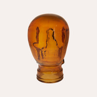 Teschio Decorativo in Vetro Arancio – Scultura per Decorazioni Moderne