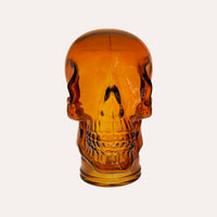 Teschio Decorativo in Vetro Arancio – Scultura per Decorazioni Moderne