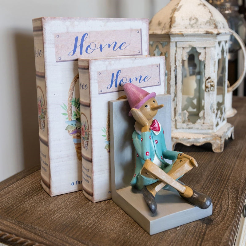 Coppia di Fermalibri con Pinocchio in Resina